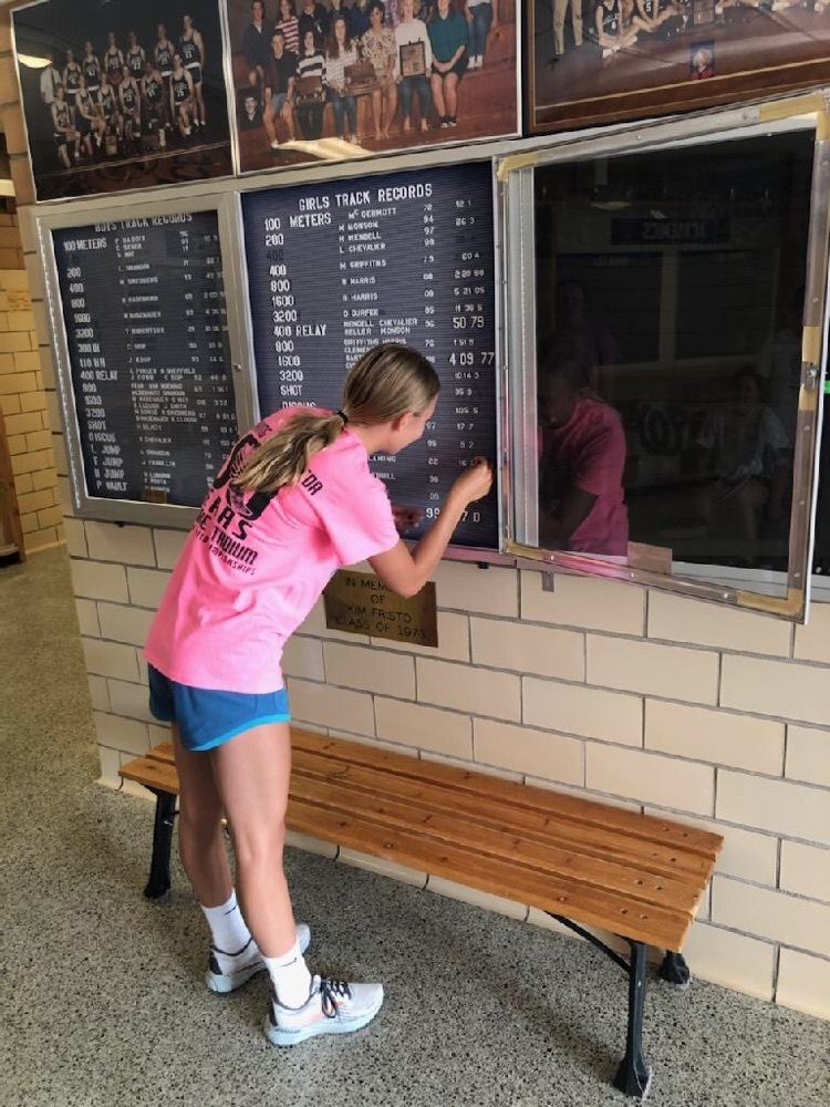 Kendyl updating the record board